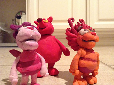 Pink, orange and red clay creatures